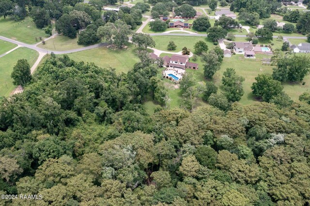 415 Fort Hamilton Dr, Opelousas, LA 70570 - bird's eye view with a wooded view