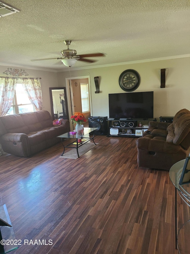 living room with ceiling fan, crown molding, and wood-type flooring