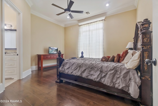 bedroom with ornamental molding, dark wood-type flooring, visible vents, and baseboards