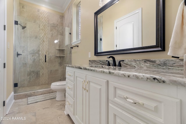 bathroom with tile patterned floors, vanity, crown molding, toilet, and walk in shower