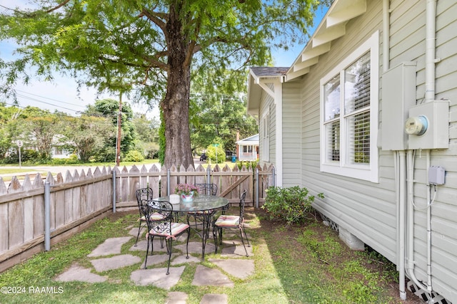 view of yard featuring a patio area and a fenced backyard