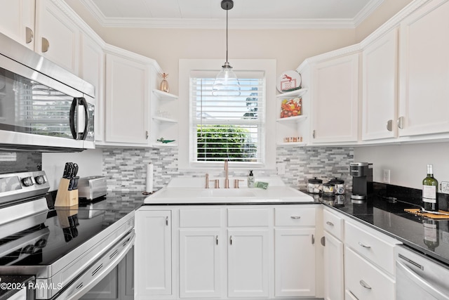 kitchen with white cabinets, appliances with stainless steel finishes, open shelves, and crown molding