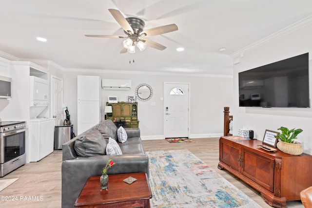 living area with stacked washer and dryer, a wall unit AC, ornamental molding, and light wood-style flooring