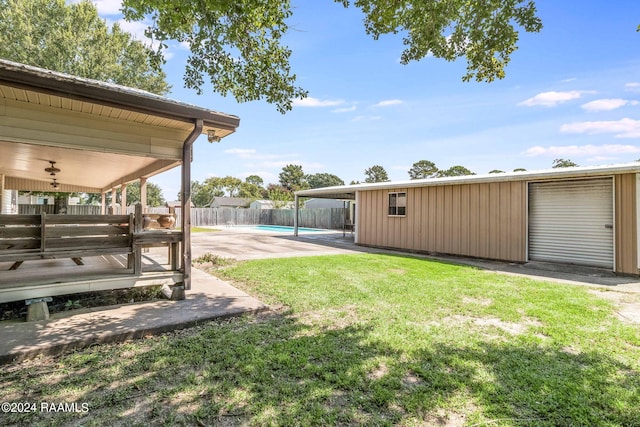 935 Pearl St, Rayne, LA 70578 - view of yard with a fenced backyard, a fenced in pool, and a patio