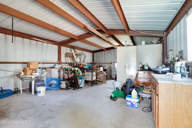 935 Pearl St, Rayne, LA 70578 - garage with metal wall and a sink