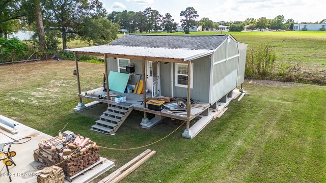 exterior space with a shed and a lawn