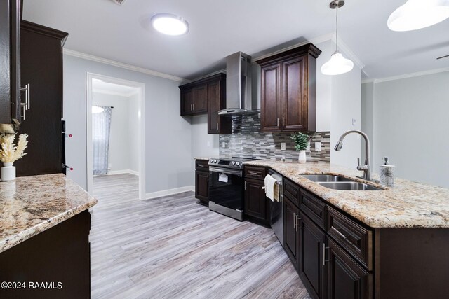 kitchen featuring stainless steel appliances, light hardwood / wood-style flooring, wall chimney exhaust hood, sink, and light stone counters