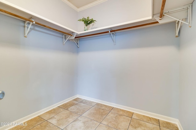 spacious closet featuring light tile patterned floors