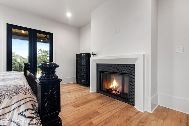 bedroom with wood-type flooring