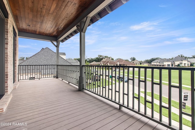 deck featuring a lawn