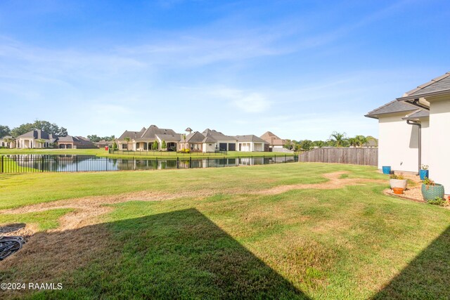 view of yard with a water view