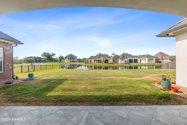 view of yard with a water view