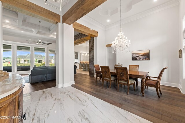 dining room with ceiling fan with notable chandelier, dark hardwood / wood-style flooring, beamed ceiling, and ornamental molding