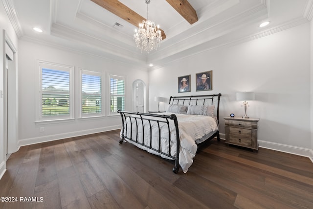 bedroom featuring a tray ceiling, an inviting chandelier, and dark hardwood / wood-style floors