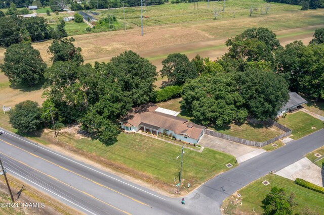 birds eye view of property featuring a rural view