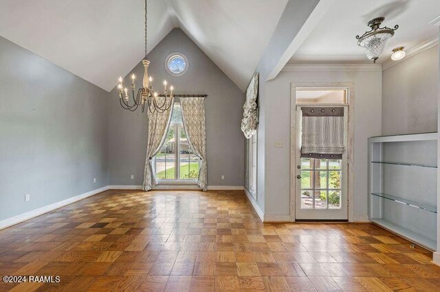 interior space with ornamental molding, a wealth of natural light, a chandelier, and parquet floors