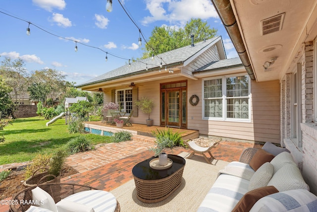 110 Charles Read Ave, Lafayette, LA 70503 - view of patio / terrace featuring ceiling fan, a playground, and an outdoor living space