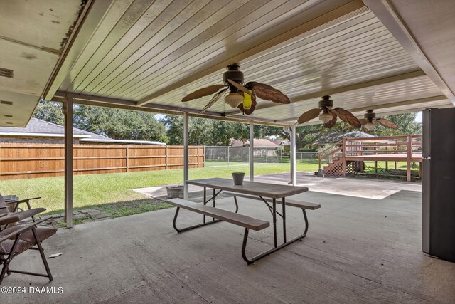 view of patio / terrace featuring ceiling fan