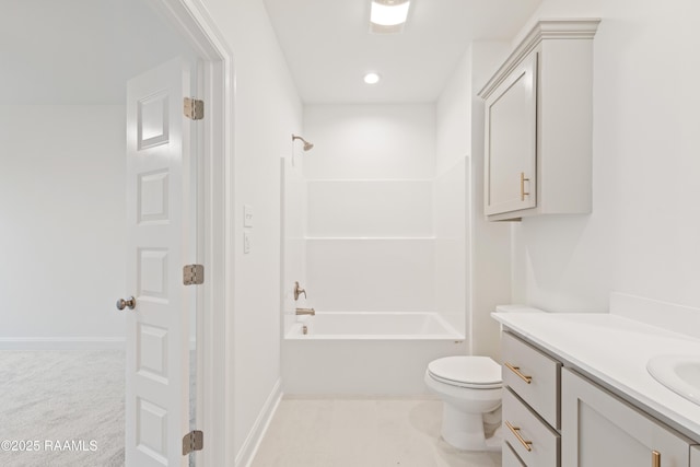full bathroom with vanity, bathtub / shower combination, baseboards, and toilet