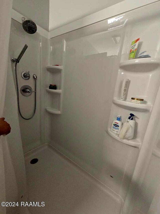 2345 Robley Dr, Lafayette, LA 70503 - bathroom featuring a walk in shower