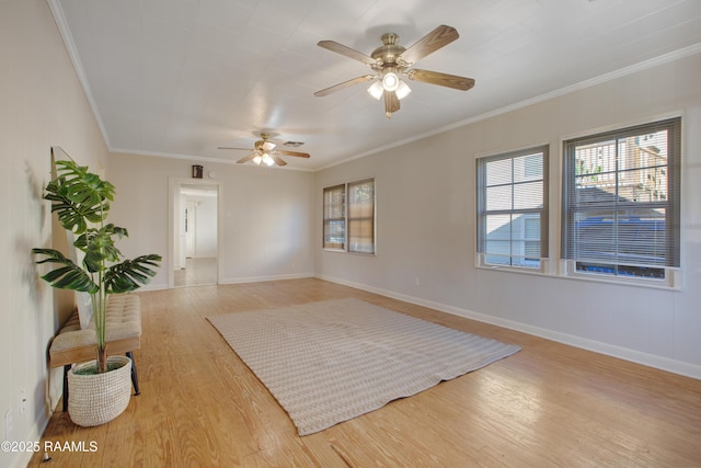 unfurnished room featuring light hardwood / wood-style floors, ceiling fan, and crown molding