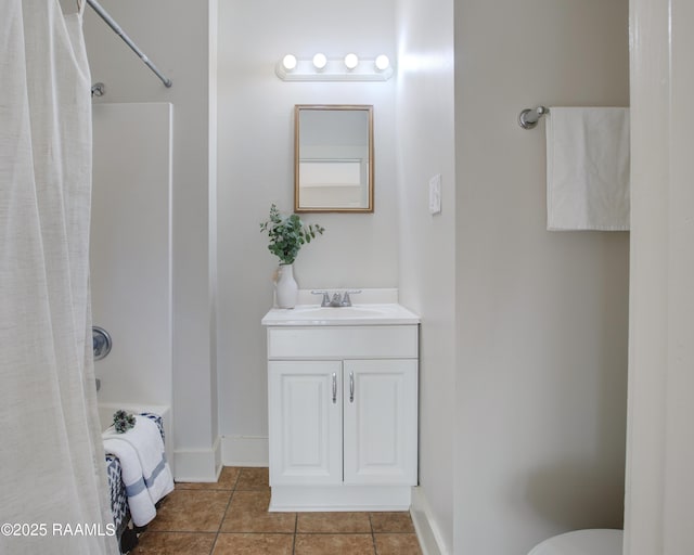 bathroom with tile patterned floors, vanity, and shower / bath combination with curtain