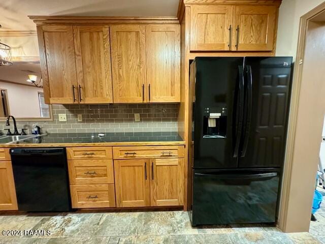 kitchen featuring tile counters, tasteful backsplash, black appliances, and sink