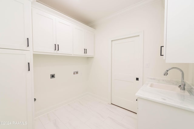 laundry room featuring cabinets, crown molding, sink, hookup for a washing machine, and hookup for an electric dryer