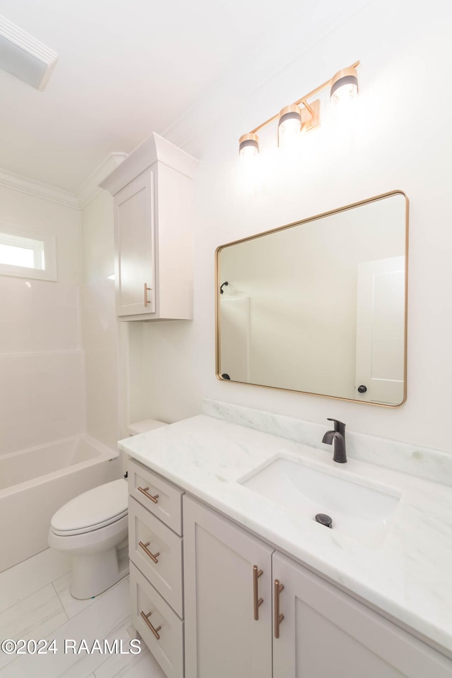 full bathroom with vanity, bathing tub / shower combination, tile patterned floors, toilet, and ornamental molding