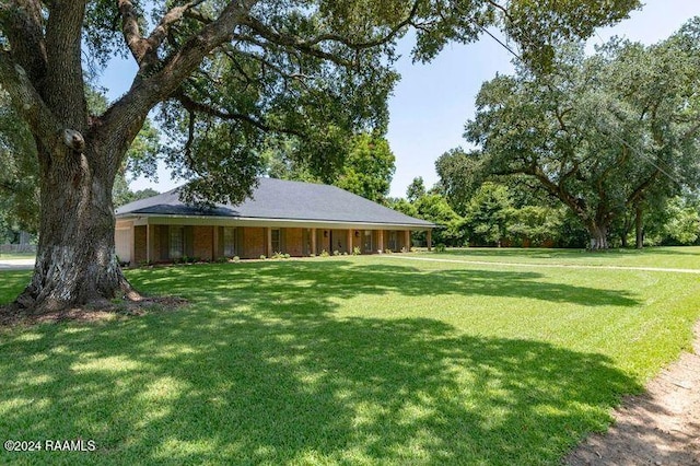 exterior space featuring a front lawn