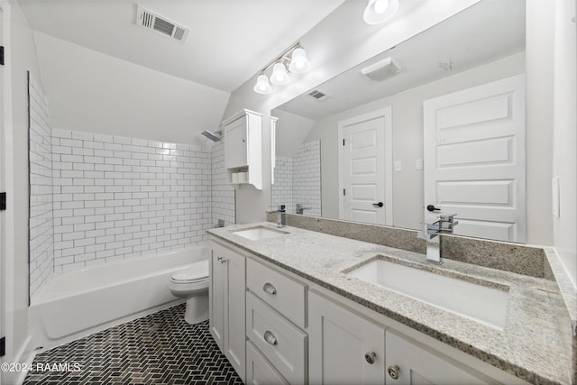 full bathroom featuring visible vents, toilet, bathtub / shower combination, and a sink