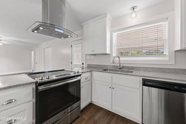 kitchen featuring a sink, dark wood-style floors, white cabinetry, appliances with stainless steel finishes, and island range hood