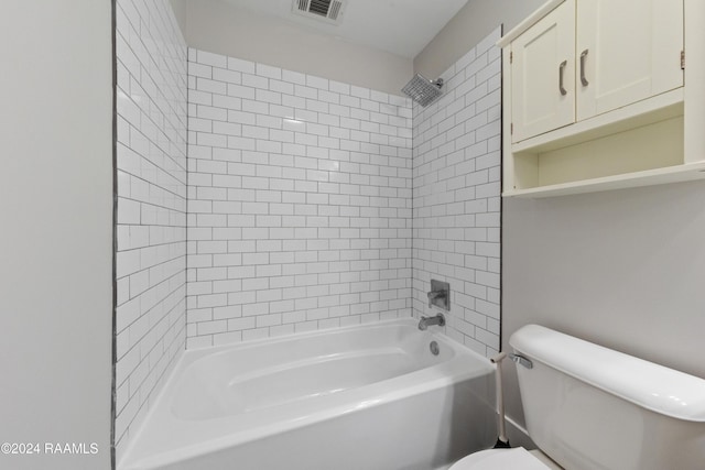 full bathroom featuring toilet, visible vents, and shower / washtub combination