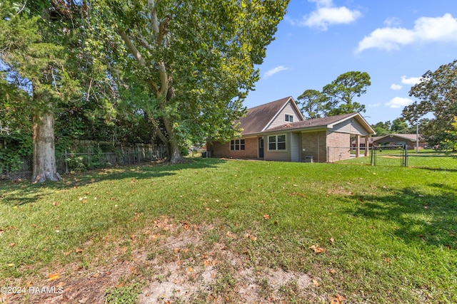 view of yard with a gate and fence