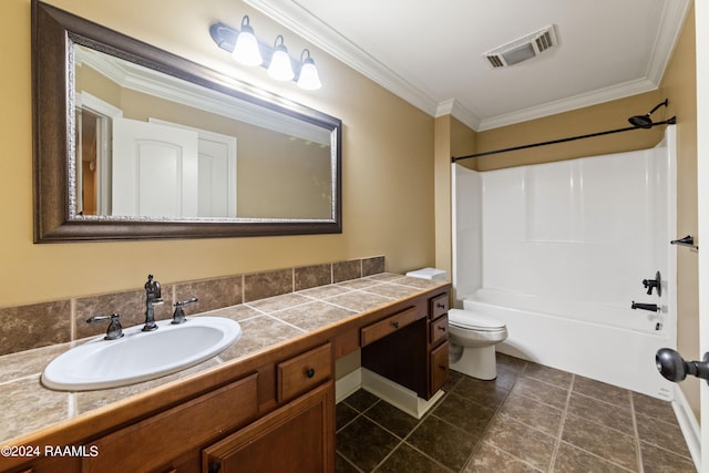 full bathroom featuring shower / washtub combination, vanity, ornamental molding, toilet, and tile patterned floors