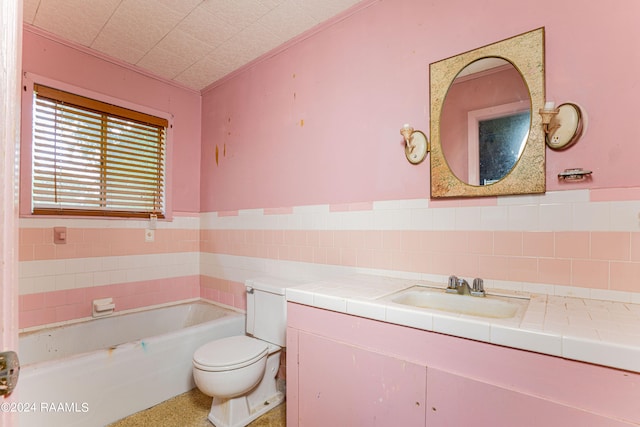 bathroom featuring backsplash, toilet, a tub, tile walls, and vanity