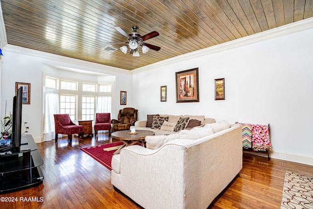 living area with crown molding, a ceiling fan, and hardwood / wood-style floors