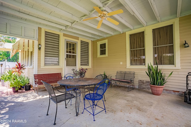 view of patio / terrace with outdoor dining area and a ceiling fan