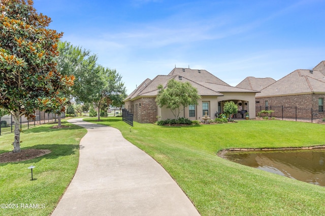 exterior space with a yard and fence