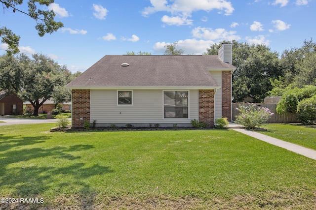 exterior space featuring a front lawn