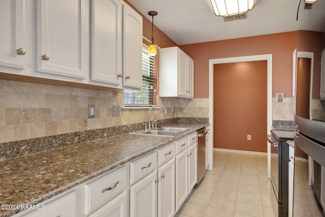 kitchen with hanging light fixtures, dishwasher, white cabinetry, sink, and a textured ceiling