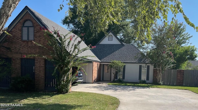 view of front of home with a front lawn