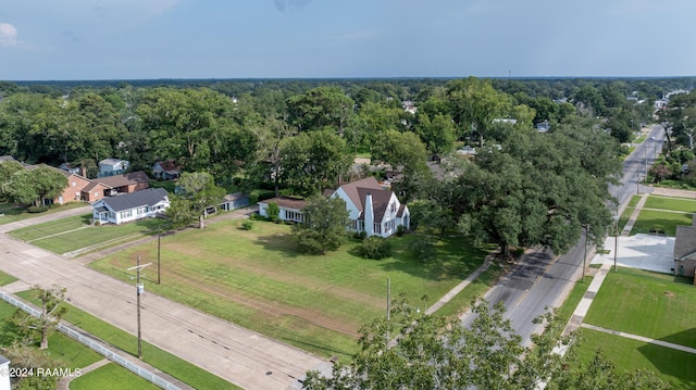 aerial view featuring a wooded view