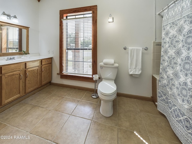 full bath with baseboards, toilet, tile patterned floors, curtained shower, and vanity