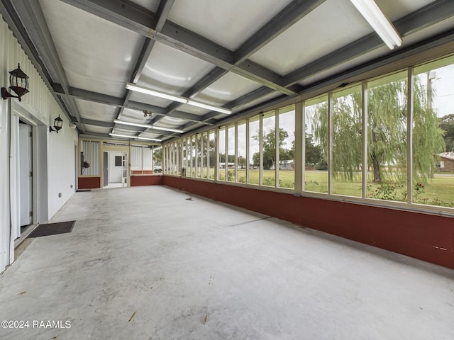 unfurnished sunroom with a wealth of natural light