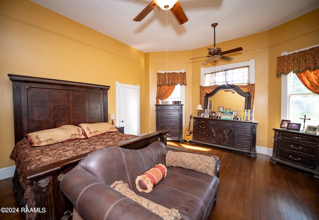 bedroom featuring ceiling fan and dark hardwood / wood-style floors