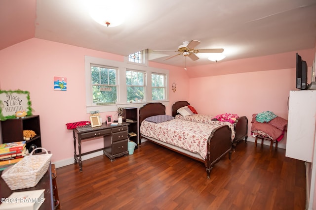 bedroom with dark hardwood / wood-style flooring, ceiling fan, and lofted ceiling