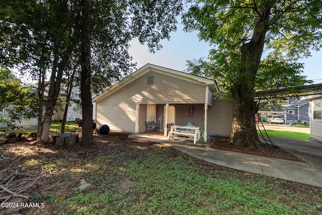 back of house with a porch