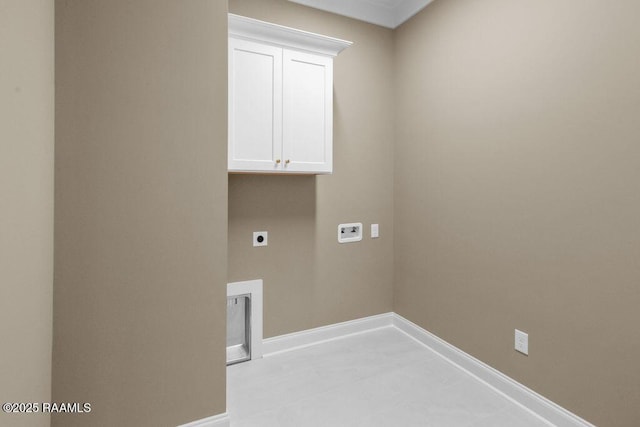 laundry area featuring cabinet space, washer hookup, baseboards, and electric dryer hookup