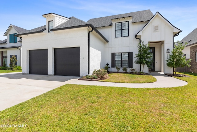 modern inspired farmhouse featuring a front lawn